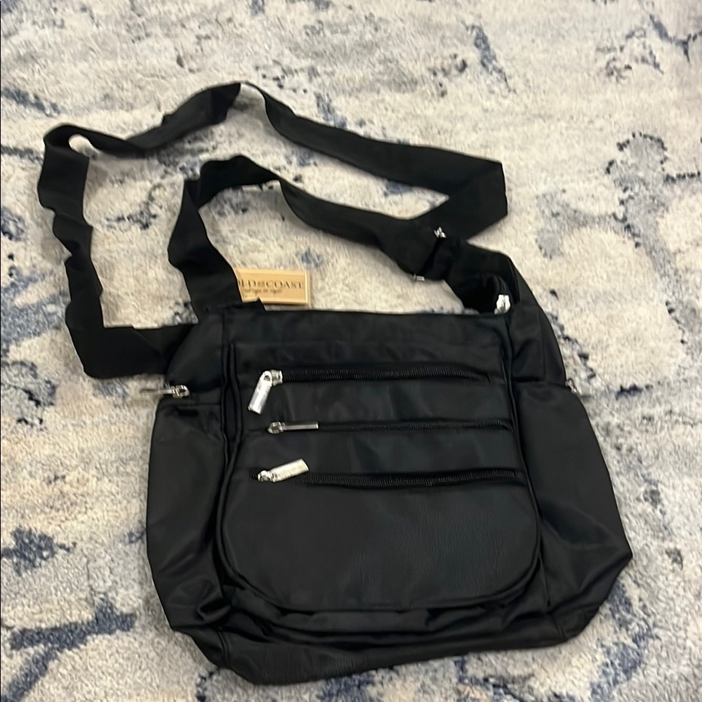 Black Messenger Bag with Adjustable Strap and Durable Fabric